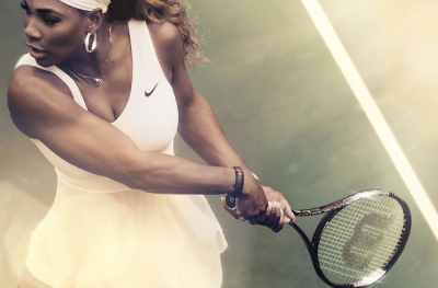 Legendary professional tennis player, Serena Williams, wearing a Nike tennis dress