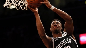 Brooklyn Nets guard Caris LeVert going for a basket.