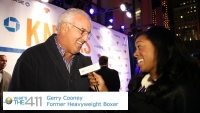 Former professional heavyweight boxer Gerry Cooney talking with What's The 411TV correspondent Bianca Peart on Chase Blue Carpet at Madison Square Garden