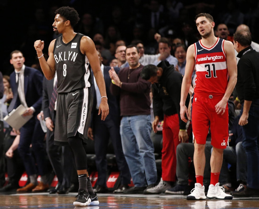 Spencer Dinwiddie, Brooklyn Nets point guard (left) feeling good, with Wizards’ Tomas Satoransky (right) looking on as Nets pull off a 103-98 win over the Washington Wizards.