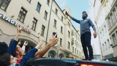 Odell Beckham surrounding by raving fans while promoting the NFL in Germany