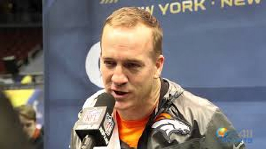 Peyton Manning, quarterback, Denver Broncos, talking with What&#039;s The 411Sports reporter Andrew Rosario at Super Bowl Media Day 2014.