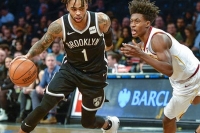 D'Angelo Russell, Brooklyn Nets guard, pushing past Cleveland Cavaliers guard Collin Sexton on December 3, 2018, at the Barclays Center
