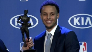 Golden State Warriors guard Stephen Curry receiving the 2015 NBA MVP Award