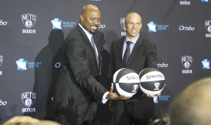 Billy King (left), Brooklyn Nets general manager introducing Jason Kidd, Brooklyn Nets&#039; new head coach, to the media