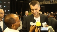 Brooklyn Nets owner Mikhail Prokhorov talking to What's The 411 reporter Andrew Rosario