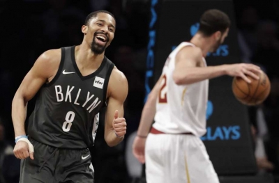 Brooklyn Nets guard Spencer Dinwiddie (l) leads his team in 113-107 victory over the Cleveland Cavaliers on March 6, 2019, at the Barclays Center   