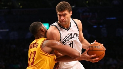Brooklyn Nets center Brook Lopez drives against Cleveland Cavaliers center Tristan Thompson during the fourth quarter at Barclays Center