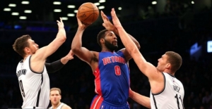 Brooklyn Nets forward/center Andrea Bargnani (9) and center Brook Lopez (11) are defending against Detroit Pistons center Andre Drummond (0) at Barclays Center.