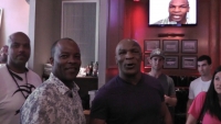Former heavyweight boxing champ Mike Tyson (r) with sports columnist George Willis (center), author of the Bite Fight: Tyson, Holyfield, and the Night That Changed Boxing Forever