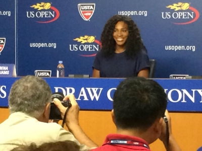 Tennis legend Serena Williams addressing the media at a 2015 US OPEN press conference