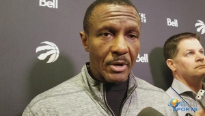Dwane Casey talking with reporters prior to the Toronto Raptors playing the Brooklyn Nets at the Barclays Center