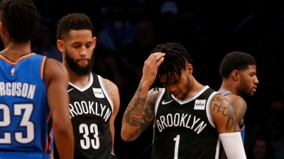 Brooklyn Nets guards Allen Crabbe (left) and D&#039;Angelo Russell (right) recognizing that game against the Oklahoma City Thunder is getting away from them