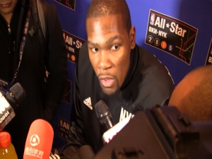 Kevin Durant talking with reporters during NBA All-Star