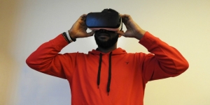 Man using Virtual Reality (VR) glasses