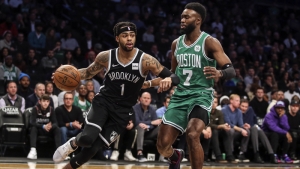 Brooklyn Nets guard, D’Angelo Russell pushing past Boston Celtics guard, Jaylen Brown. The Nets defeated the Celtics 109-107, it’s the first win for the Nets over the Celtics in the last 10 meetings between these two teams. 