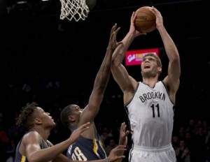 Brook Lopez going up for basket in Brooklyn Nets 120-110 win over the Indiana Pacers