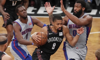 Brooklyn Nets guard Spencer Dinwiddie surrounded by Detroit Pistons players, Reggie Jackie (left) and Andre Drummond (right) at a basketball game at the Barclays Center on March 11, 2019. The Brooklyn Nets defeated the Detroit Pistons 103-75.