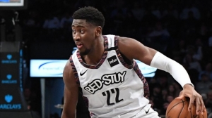 Brooklyn Nets guard, Caris LeVert, handles basketball with aplomb and scores his first triple-double in a game against the San Antonio Spurs on March 6, 2020, at the Barclays Center in Brooklyn, NY.